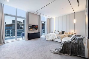 King Suite with walk in wardrobes, sofa bed, smart TV, en-suite, balcony and panoramic views