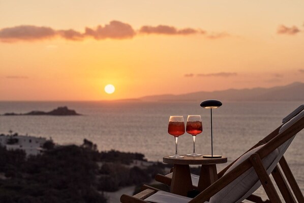 Enjoy a glass of a fine refreshing beverage to the view of the best sunsets you'll ever experience.