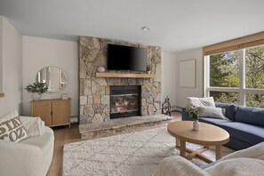 Living room with Fire Place & Smart TV