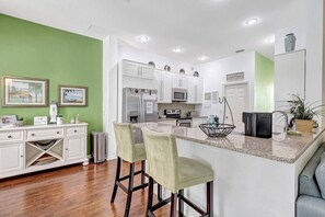 View of kitchen with breakfast bar