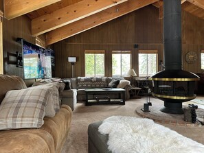 Open floor plan great room with circular fireplace