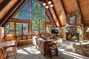 LIVING ROOM WITH WOOD BURNING FIREPLACE