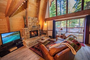 Living Room with Leather Couch and Flat Screen TV