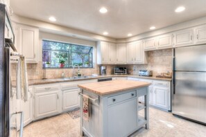 Updated Kitchen with Butcher Block Island