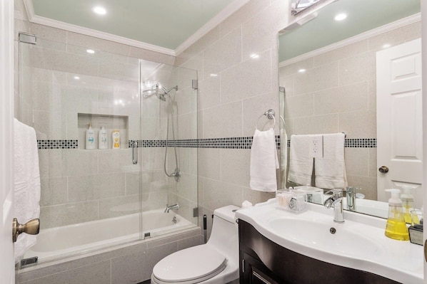 Master bathroom with bath tub