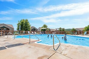 The neighborhood pool is located right across the street and open in the summer months!