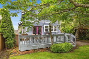 The beautiful backyard, with outdoor dining area