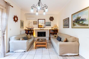 Cozy living room with greek allure