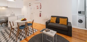 The Living Area And Laundry Cupboard Of Heart Of Old Town Apartment 1 In Funchal Old Town By Ourmadeira