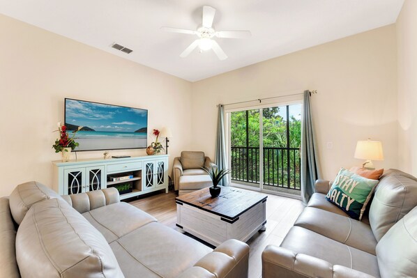 Curl up in the serene living room & stream all your favorite entertainment