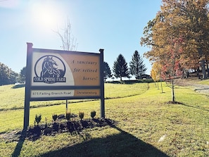 Farm sign at entrance.