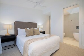 The primary bedroom has generous space and the privacy and ease of a large ensuite bathroom. 
