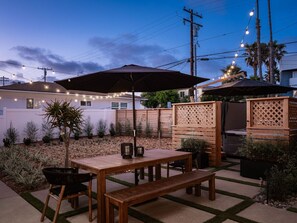 Unwind in the courtyard with seating, ideal for enjoying the night sky.