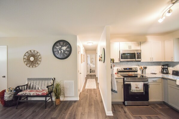 Hallway leading to 3 bedrooms/ 2 full bathrooms