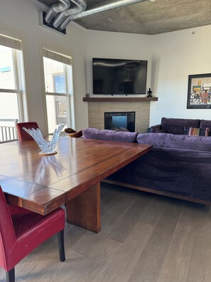 Fireplace mount TV pulls down for comfortable viewing.