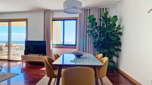 Step into the inviting dining room, where elegance meets comfort. With ample space and tasteful decor, enjoy intimate meals or entertaining guests with panoramic ocean vistas. #spacious #oceanview #balcony