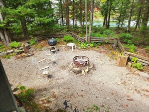 Gather around the outdoor fire pit for a cozy evening under the stars, complete with seating for everyone.