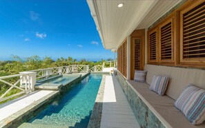 Indulge in the unique pool and jacuzzi while taking in the ocean views