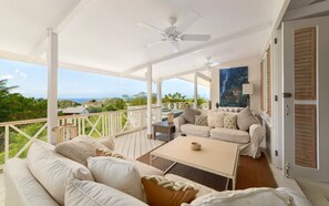 Comfortable covered lounge space on the deck