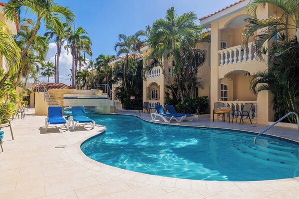 Sun-soaked afternoons await you by the crystal-clear waters of our pool. Unwind, bask, and make a splash!