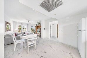Whether you're whipping up your favorite recipes or trying something new, the open layout ensures you can still chat with loved ones in the dining area or living room while you cook.