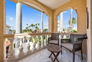 Our balcony, complete with a charming small table and chairs, invites you to sip your coffee while soaking in the fresh air and scenic views.