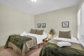 Bedroom 2 with Full size bed and Twin.