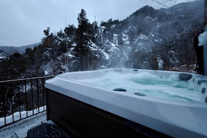 Take a relaxing soak in the Jacuzzi with canyon views galore.
