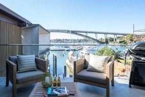 Savour Your Morning Brew with a Stunning View of Gladesville Bridge and the Waterfront
