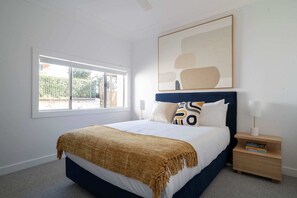 Recharge in Royalty in This Queen Bedroom Retreat, Where Serenity Meets Style