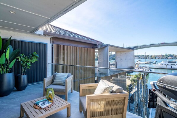 Savour Your Morning Brew with a Stunning View of Gladesville Bridge and the Waterfront