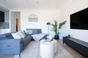 Lounge in Luxury with Your Favorite Shows and Ultimate Comfort