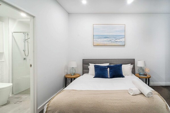 Main Bedrooms with ensuite and large shower with access to the balcony
