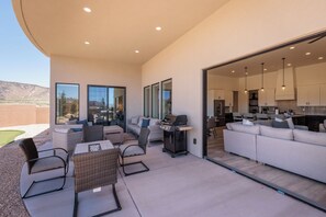 Back Patio Sliding Door Open - The back patio sliding door opens all the way making this a fun feature for friends and family.