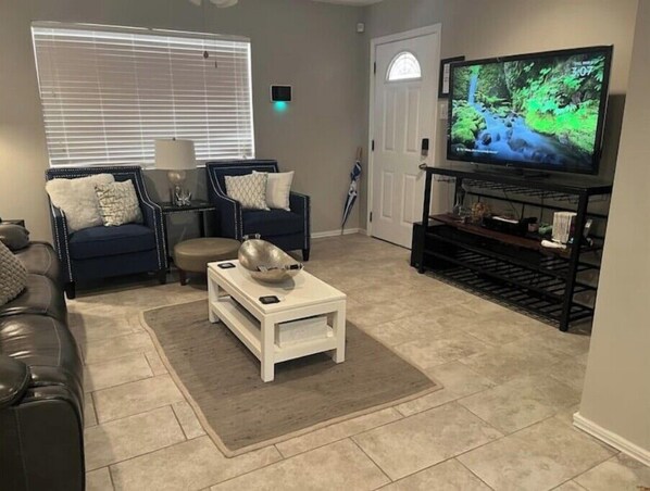 Large 3D HD surround sound TV in living room, like being at the theater. 