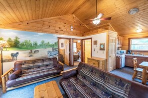 Spruce Cabin Living Space & Kitchen

Enjoy the feeling of home with comfortable futon couches, a table & chairs, dish network, & a full kitchen!  Choose not to cook, no problem!  There are plenty of great Supper Clubs, Bars & Grills, & Restaurants near by!