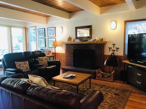 Sea Pines Living Area With Wood Burning Fireplace - Sea Pines living area with wood burning fireplace.