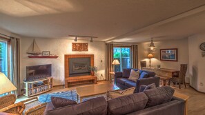 Sandcastle C-1 Living Area and Gas Fireplace - Sandcastle C-1 living area and gas fireplace.