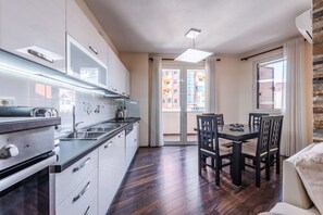 Fully-Equipped Kitchen & Dining Area