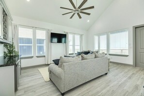 Living Room Area with Flat Screen TV and Xfinity Cable