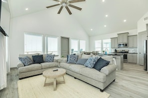 Living Room Area with Flat Screen TV and Xfinity Cable