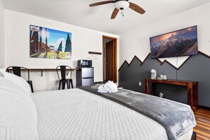 Relax and unwind in this serene bedroom, where the moon phases watch over you