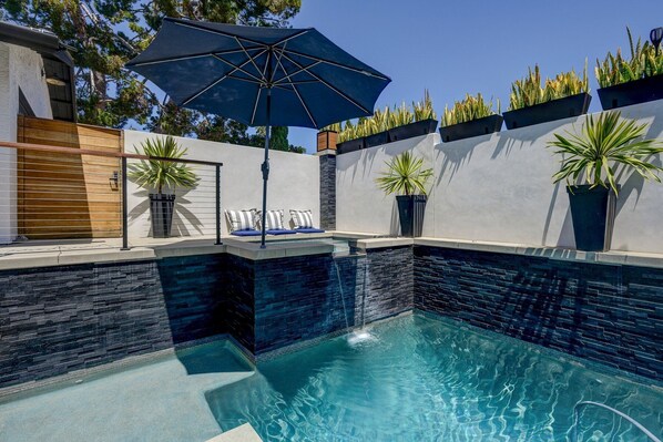 Treat yourself to a soothing soak in the hot tub