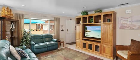 Lots of seating in the living room that provides space to chat, watch TV, plan your day!