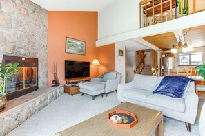 Living Room | Decorative Fireplace | Split-Level Condo