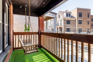 Chill in our balcony swing chair, offering comfort and a unique vantage point. Great for relaxing with a view