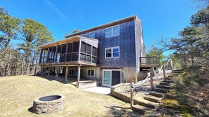 Home has a wonderful screen porch and nice yard with a fire pit