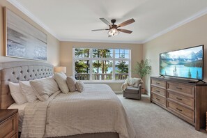 Primary King Suite with lake views and ensuite bathroom