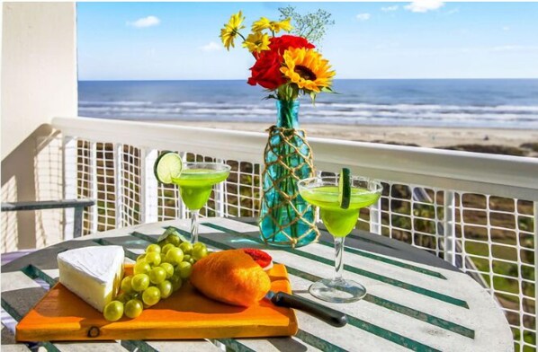 Stunning scenery, sunrises, the gulf breeze, tropical sunshine, and fun times await at "Beachfront Sunrise!"