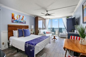 One Queen bed and a murphy bed, (behind couch) for extra sleeping space.  Streaming TV and an ocean view!